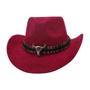 Detail of burgundy wide brim cowboy hat featuring a colorful woven band and silver bull skull