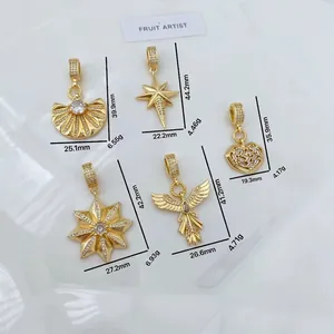 Gold starburst and heart pendant necklace charms with zircon stone inlays set
