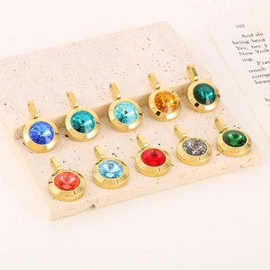 Close-up of ten colorful crystal pendants in gold-plated stainless steel settings