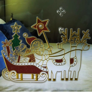 Golden Santa Claus with reindeer sleigh Christmas window stickers with festive glitter effect