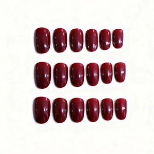Glossy burgundy red oval press-on nails set with shiny mirror finish 18 pieces