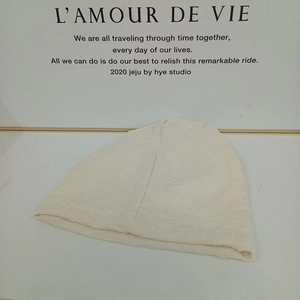 Cream knit beanie hat with 3D texture for men and women, warm winter ear protection style