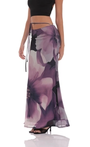 Detailed close-up of a purple floral mesh maxi skirt with a drawstring waist and flowing fit