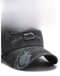 Detailed macro view of New York 1985 embroidery on washed cotton vintage baseball cap