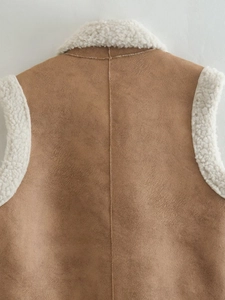 Detailed back view of brown faux suede vest with soft white faux shearling lining