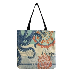 Minimalist large capacity tote bag with blue octopus print and black handles