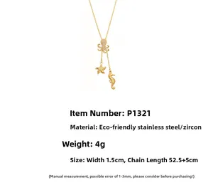 Détail des pendentifs poulpe, étoile de mer et hippocampe sur chaîne en acier doré