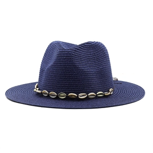 Handmade navy blue woven straw cowboy hat with white seashell band for summer beach sun protection