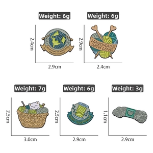Detail set of five cute cat and knitting yarn enamel pins showing size and weight specs