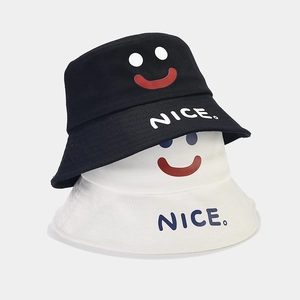 Japanese style smile face bucket hats in black and white colors for couples