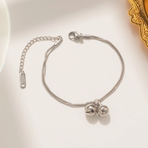 Double-layer silver snake chain bracelet with two bells and adjustable lobster clasp