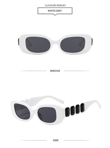 Detail view of white square frame sunglasses with black crystal temple accents and grey lenses