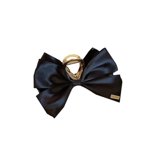 Elegant black satin double-sided bow hair claw clip with golden alloy accents for women
