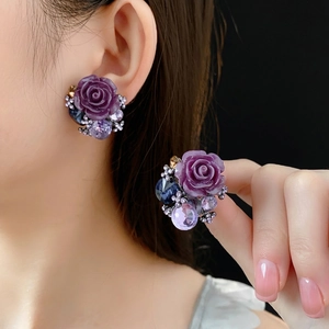 Vintage luxury purple rose flower stud earrings with blue zircon crystals on model