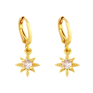 Golden huggie hoop earrings featuring zircon star charms in a minimalist jewelry style