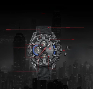 Vue détaillée du cadran de montre de sport noir et rouge avec calendrier et bracelet fibre