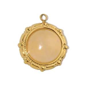 Close-up of gold oval natural stone pendant with scalloped edge detail for DIY jewelry