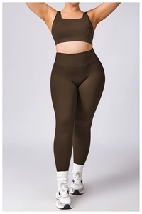 Deep brown two-piece yoga set featuring high-waist leggings and a supportive sports bra