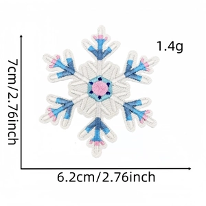 Detailed size view of snowflake embroidery patches in blue and pink with iron-on backing