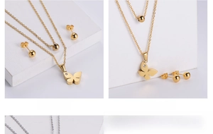Detail of double-layer stainless steel necklace with butterfly pendant and ball studs