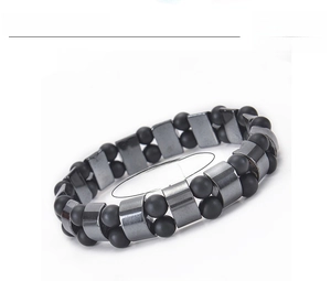 Detailed view of 6mm black matte beads and rectangular hematite stones on double-layer bracelet