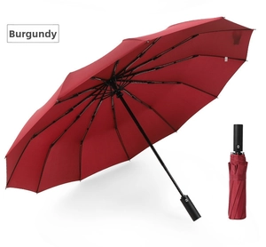 Detail view of wine red automatic folding umbrella in both open and closed positions