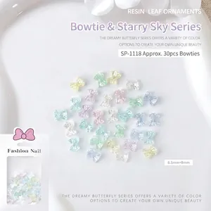 Detailed macro of 6.5x8mm bow-shaped resin nail charms in assorted macaron pastel colors