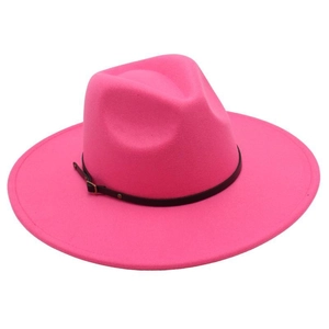 Detail of rose pink fedora hat featuring a wide brim and black belt with gold buckle