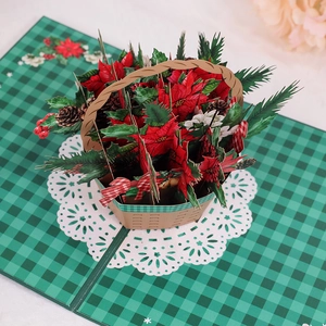 3D Pop-up Christmas card featuring a red poinsettia flower basket on green plaid base