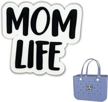 Detail of purple rubber tote bag featuring a white MOM LIFE decorative charm