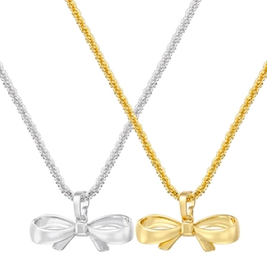 Detail showing elegant hollow bow pendants in gold and silver finishes on textured chains