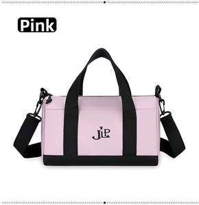 Pink nylon pillow bag with black straps and JLP logo shown in front view for detail