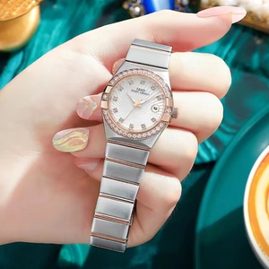 IBSO elegant women's watch with two-tone steel band, crystal bezel and date display