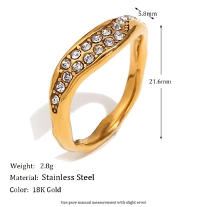 Irregular wave stainless steel ring with 18K gold plating and pavé white zircons