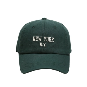 Dark green cotton baseball cap featuring white New York N.Y. embroidery on white background