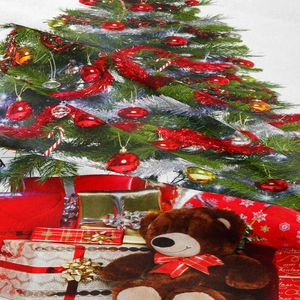 Detail of Christmas tapestry featuring a teddy bear, gift boxes and festive tree print