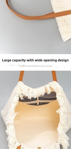 Detail showing large opening and spacious interior of ivory embroidered canvas tote bag