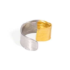 Modern two-tone asymmetric wide ring in gold and silver with hammer texture