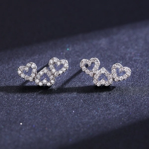 Elegant S925 sterling silver hollow heart stud earrings with sparkling pavé micro-inlay