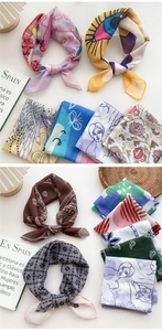 Detailed view of various colorful cotton linen neck scarves with diverse artistic prints
