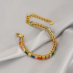 Gold stainless steel tennis bracelet featuring colorful square-cut rainbow cubic zirconia