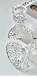 Detail of crystal glass candle holder featuring diamond-cut texture and elegant facets