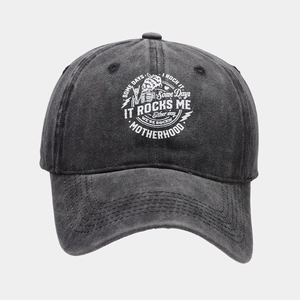 Close-up of vintage washed grey cotton baseball cap with white skull print detail