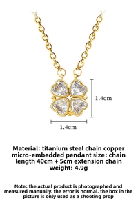 Detail of four-leaf clover pendant with crystal hearts and gold beaded edge dimensions