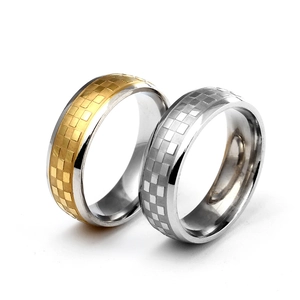 Detail showing 6mm titanium steel rings with gold and silver checkered pattern