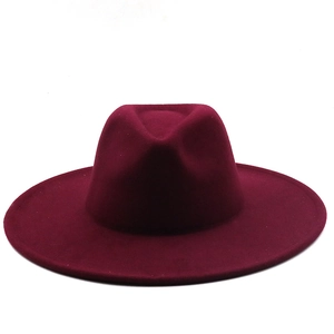Front view of a classic burgundy wool wide-brim fedora hat with a flat brim on white background