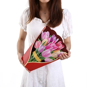 Close-up of a large 3D pop-up greeting card featuring a colorful tulip flower bouquet