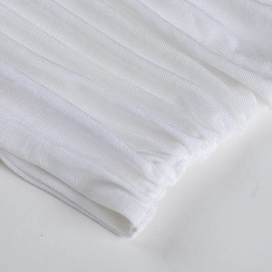 White ribbed pleated cropped tank top fabric detail, soft stretchy material texture shot.