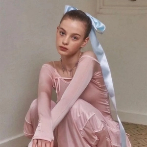Pink off-shoulder dress with ribbon details and a matching light blue hair ribbon bow