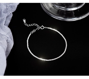 Close-up of S925 sterling silver chain with adjustable extender and spring ring clasp